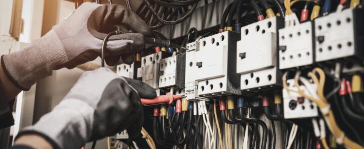 Electrician working with wires
