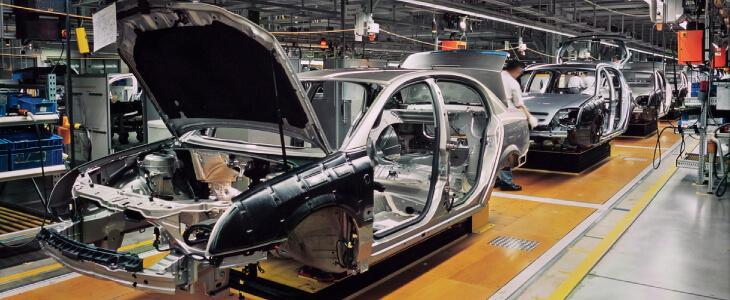 Car in factory assembly line.